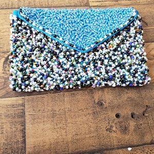 Blue beaded clutch
